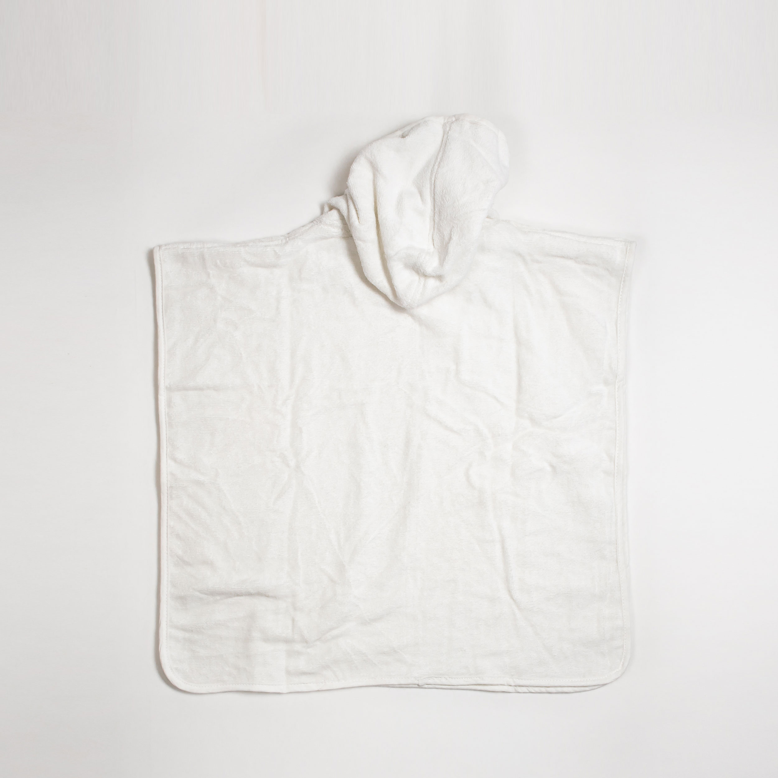 PONCHO-WH-BACK.jpg PONCHO-WH-BACK.jpg